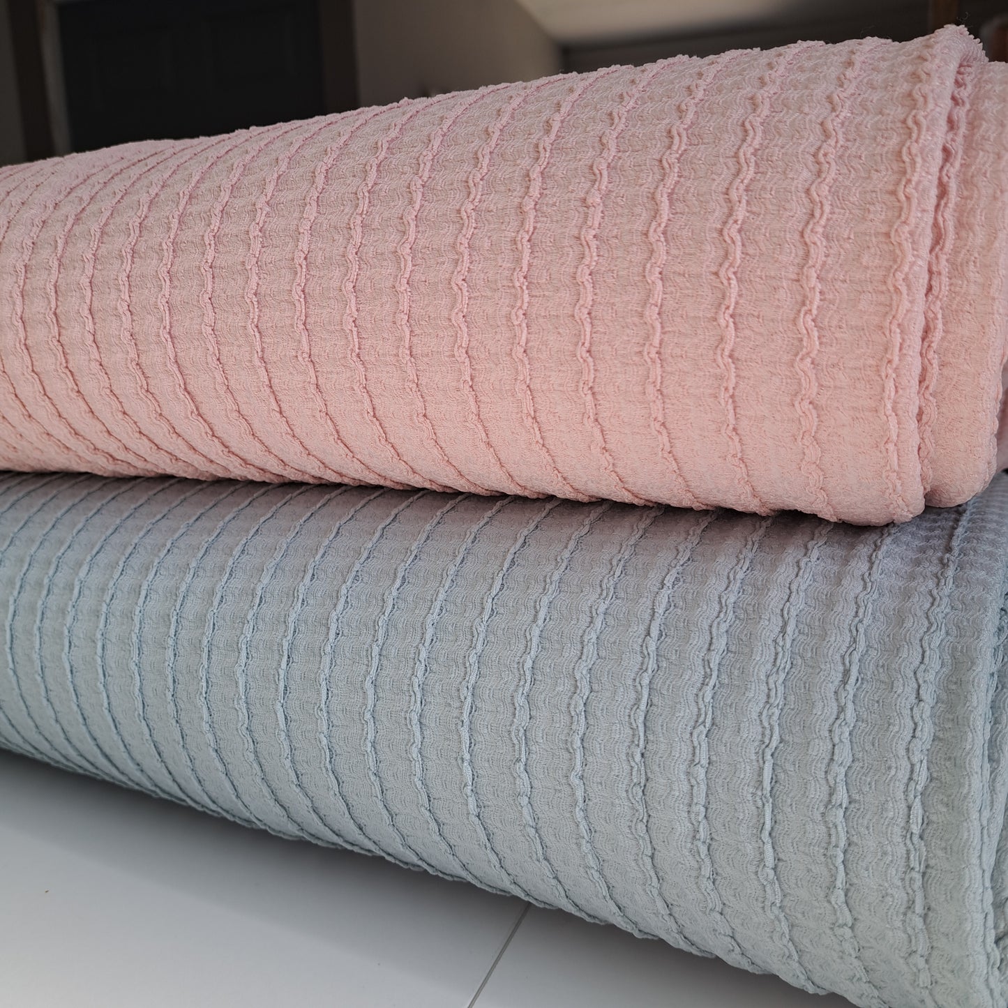 97% Polyester, 3% Spandex Textured Knit. SOLD BY HALF METERS