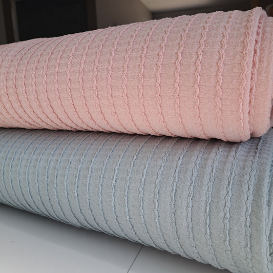 97% Polyester, 3% Spandex Textured Knit. SOLD BY HALF METERS