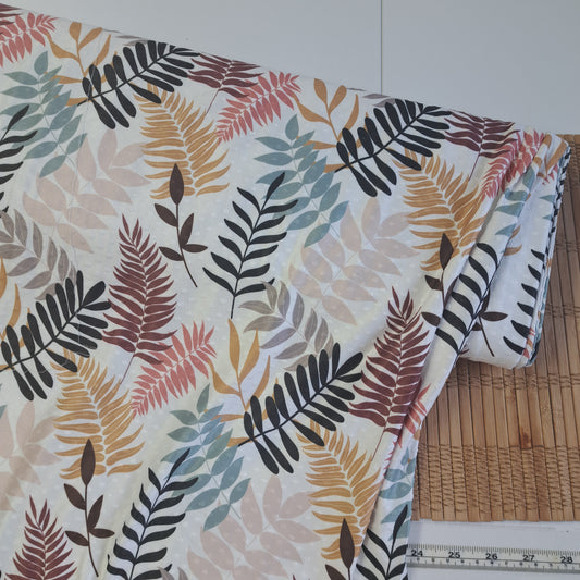 Autumn leaves, Swiss dot knit, SOLD BY HALF METERS