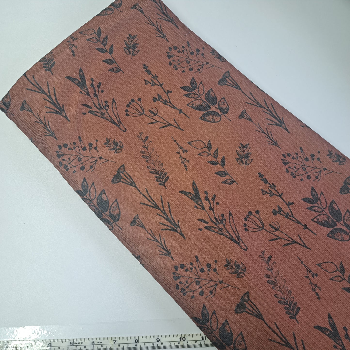 Mocha floral, SOLD BY HALF METERS